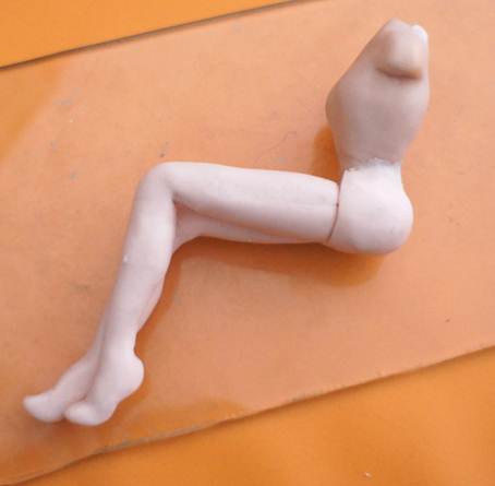 Глиняная кукла